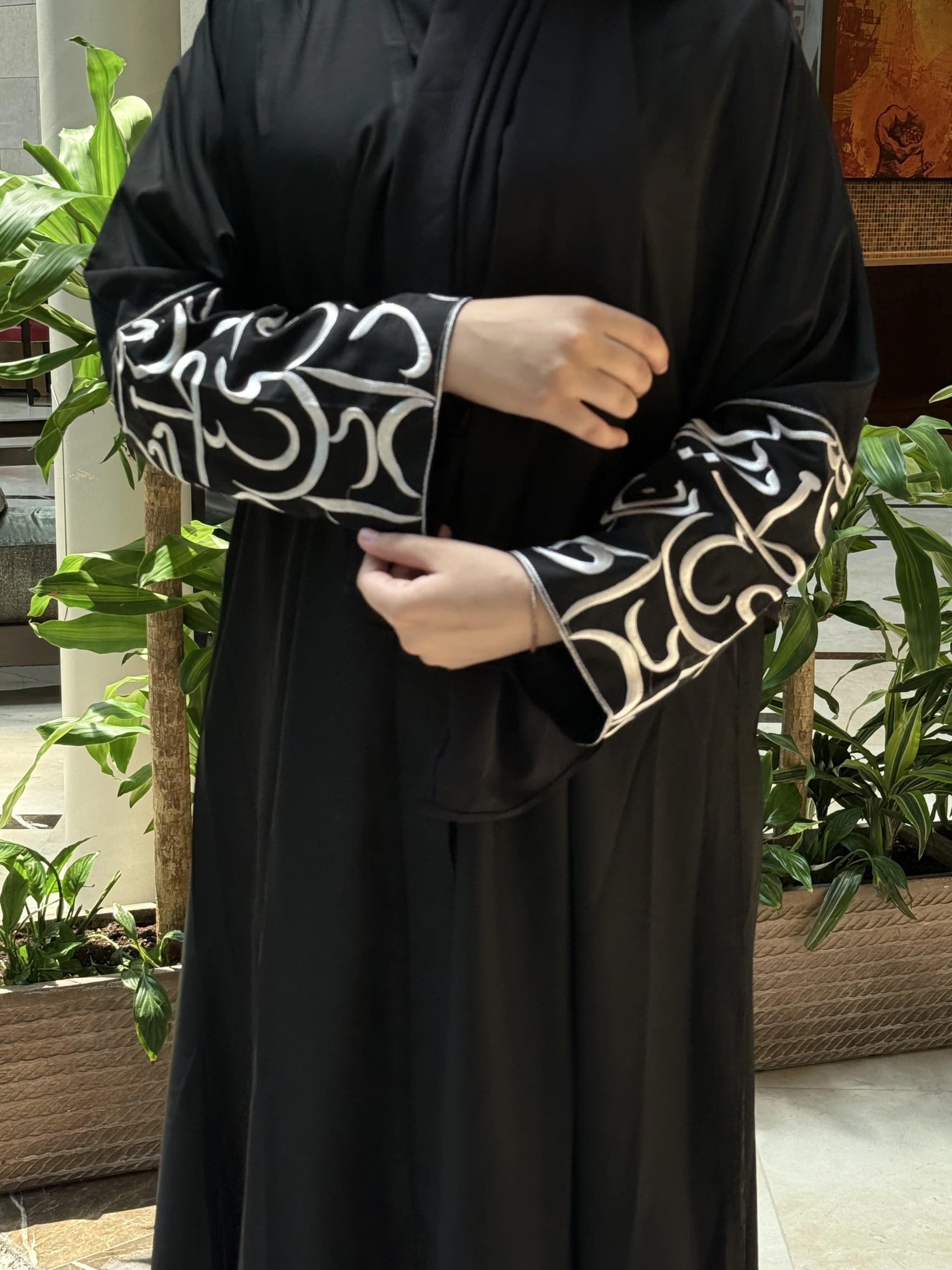 Abaya with white embroidered cuffs