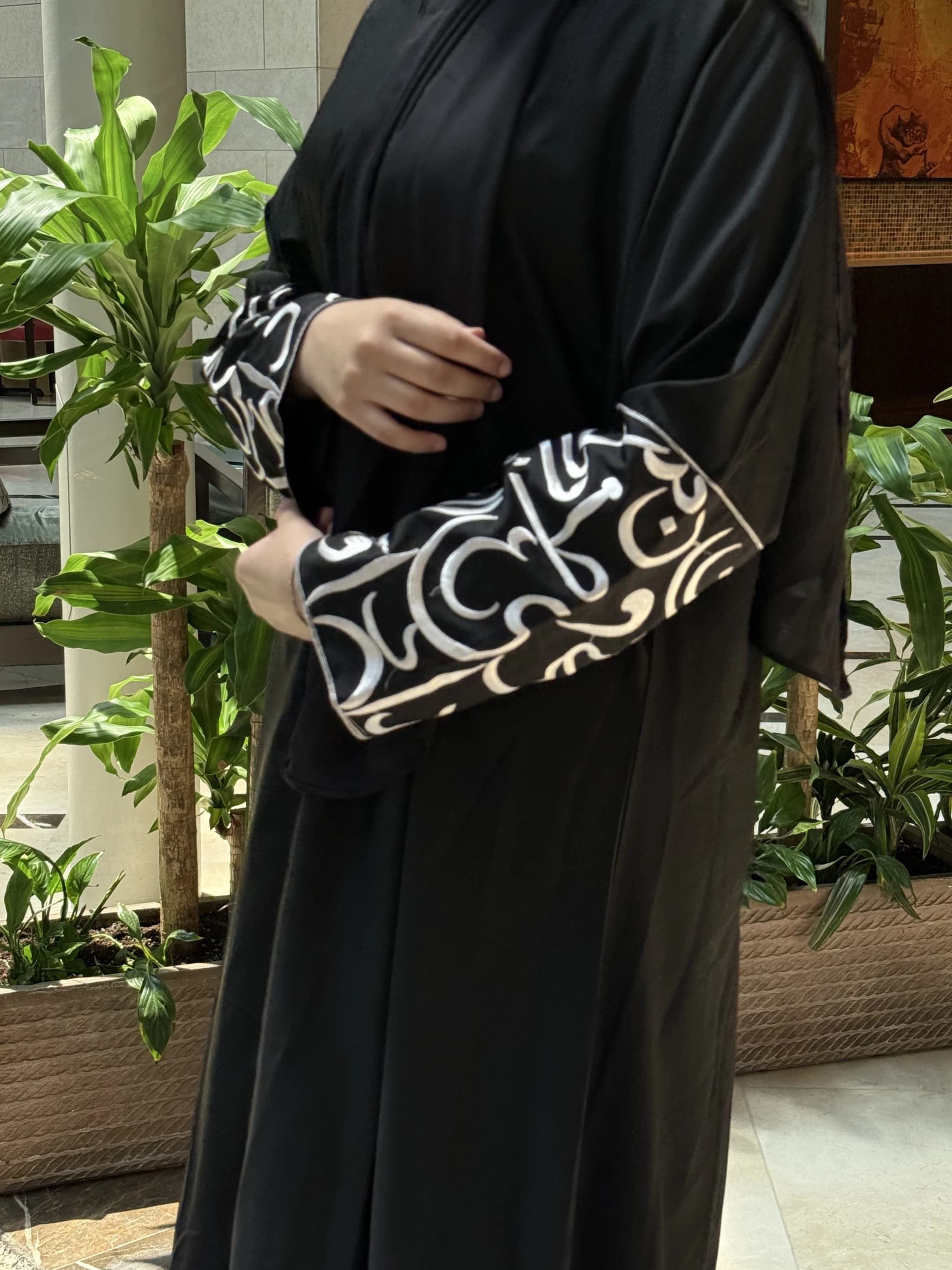 Abaya with white embroidered cuffs