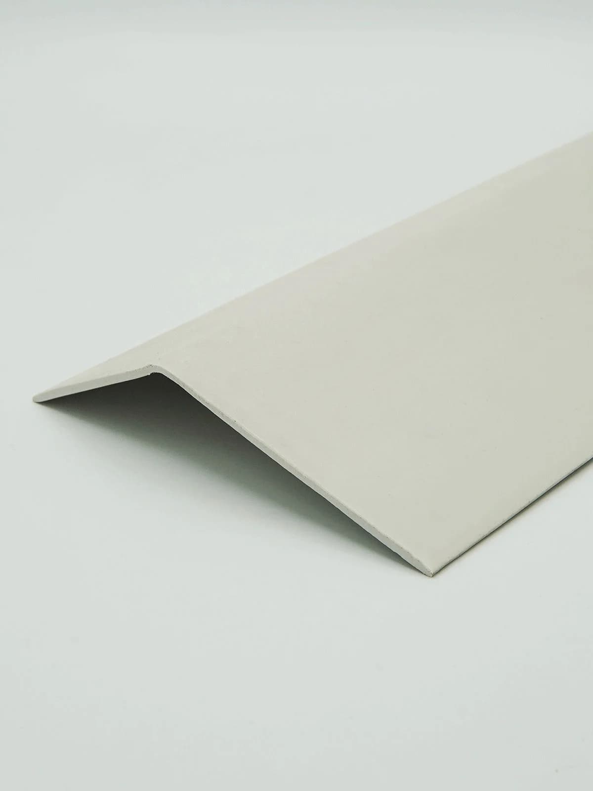 angled beige plastic profile