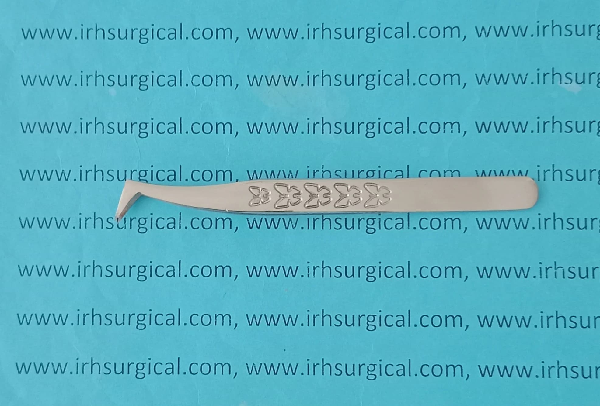 Angled eyelash tweezers