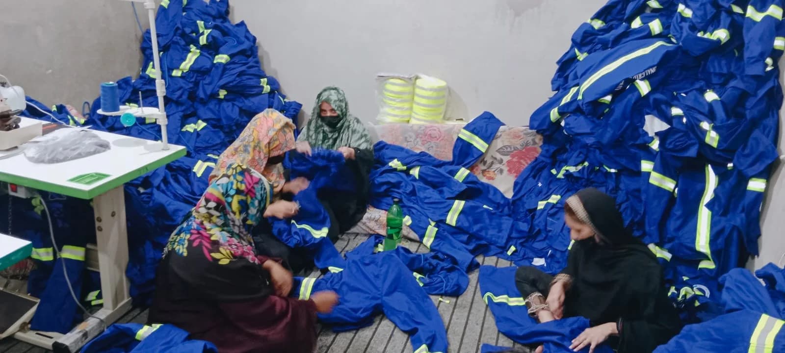 Blue reflective uniforms in production