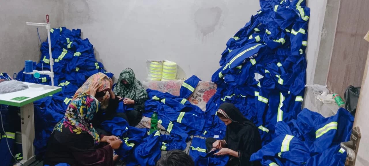 Blue reflective uniforms in production