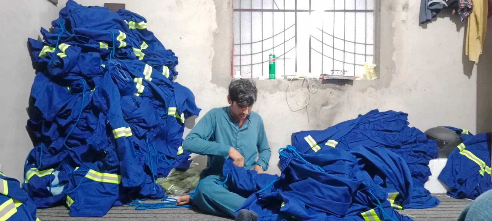 Blue reflective uniforms in production