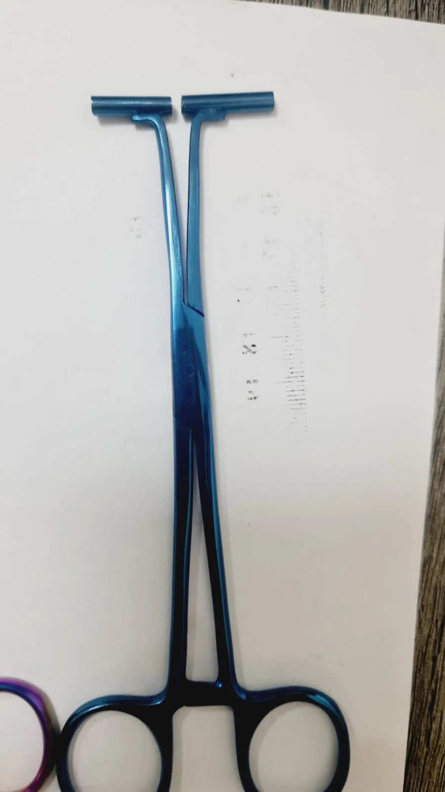Blue single hole pliers