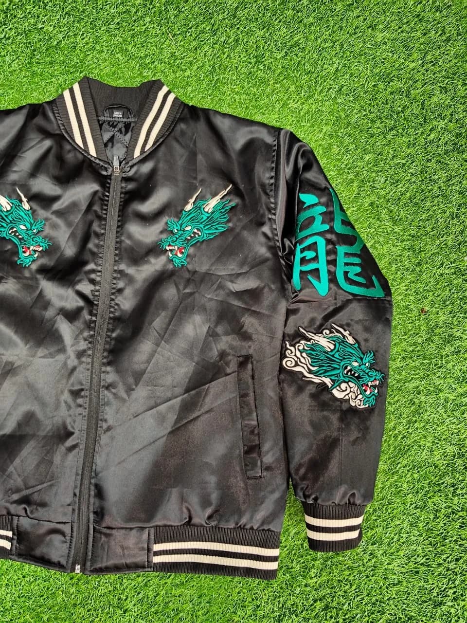 Bomber jacket with sleeve dragon detail