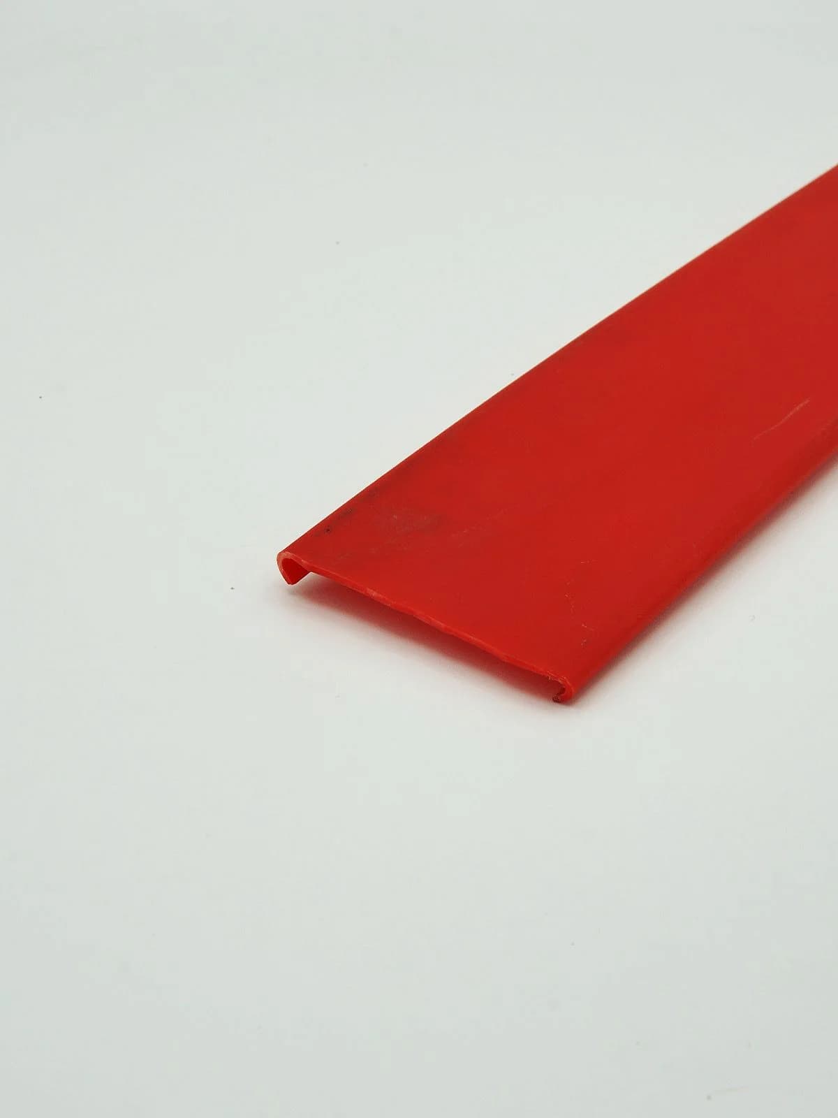 flat red plastic profile