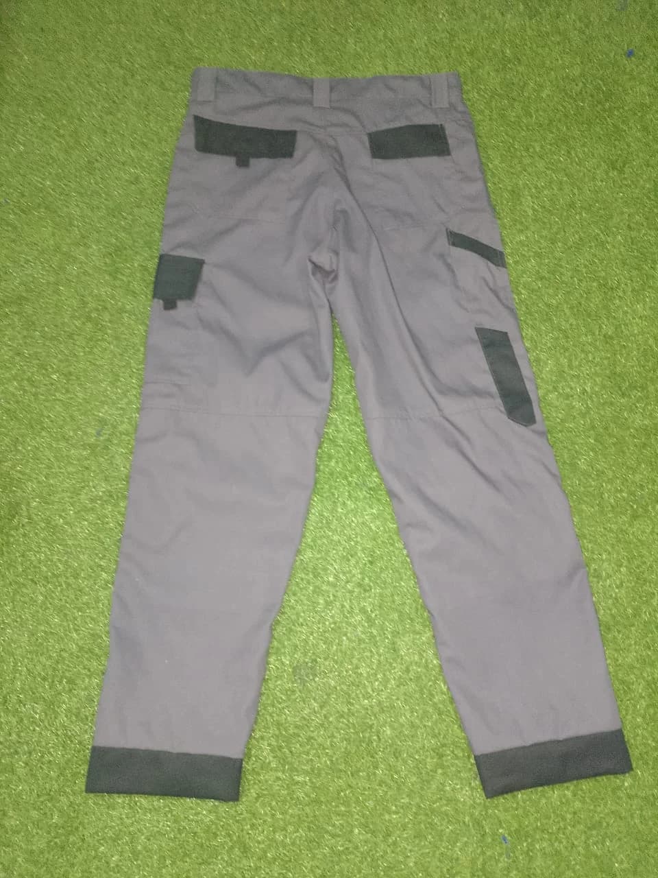 Grey work trousers