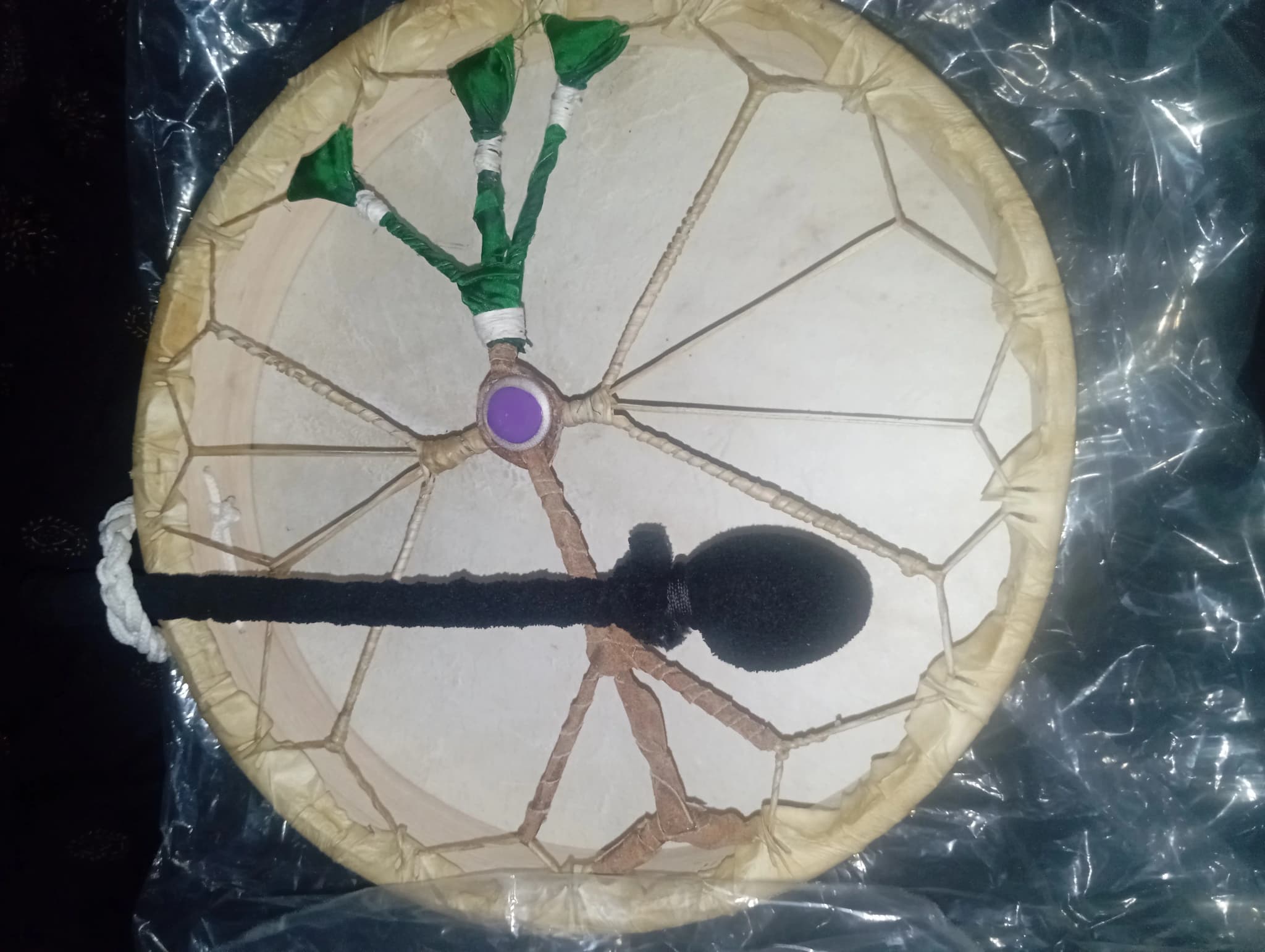 Hand drum with beater