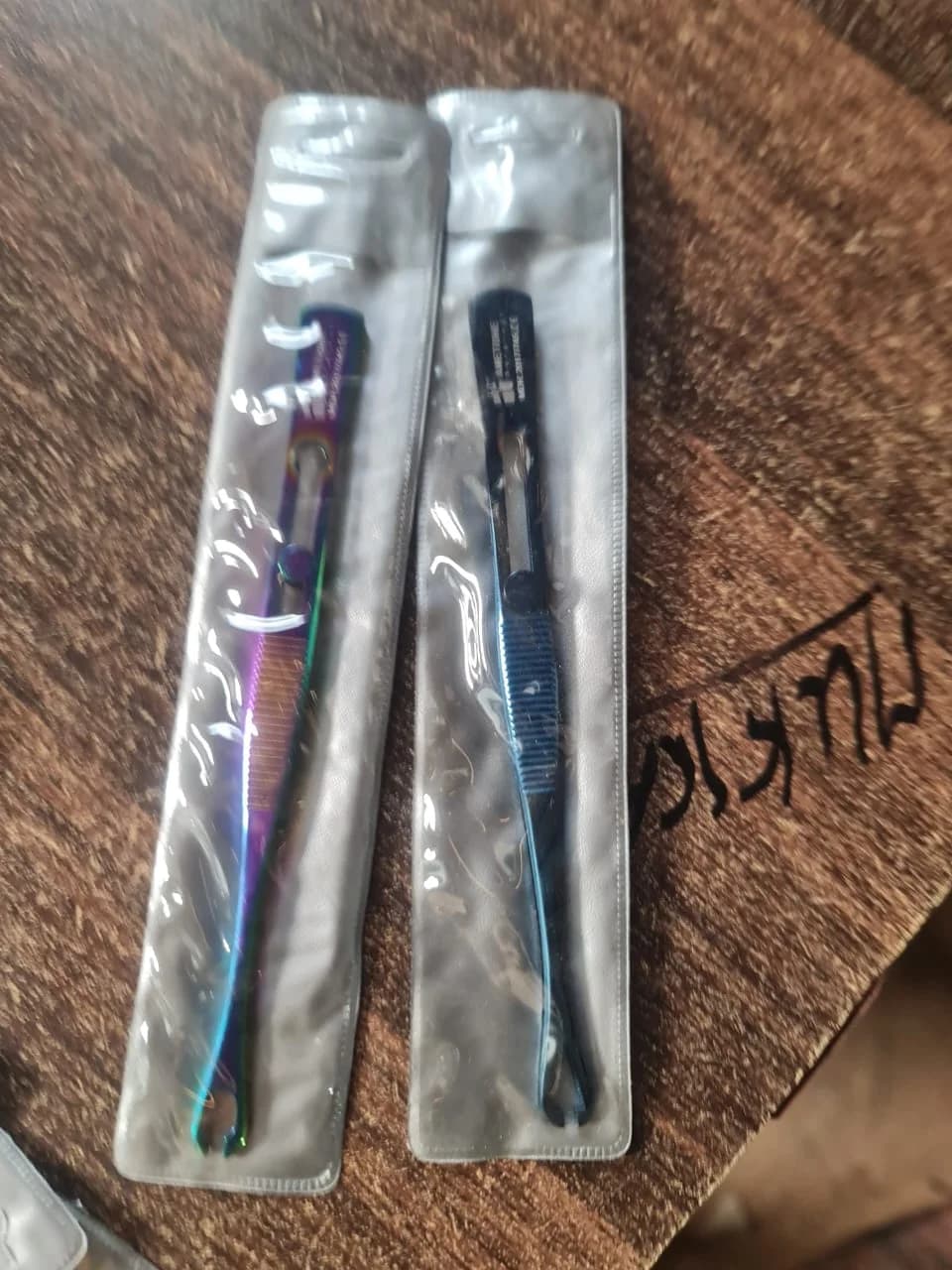 Metal piercing forceps