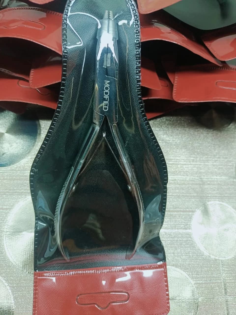 Modified piercing pliers