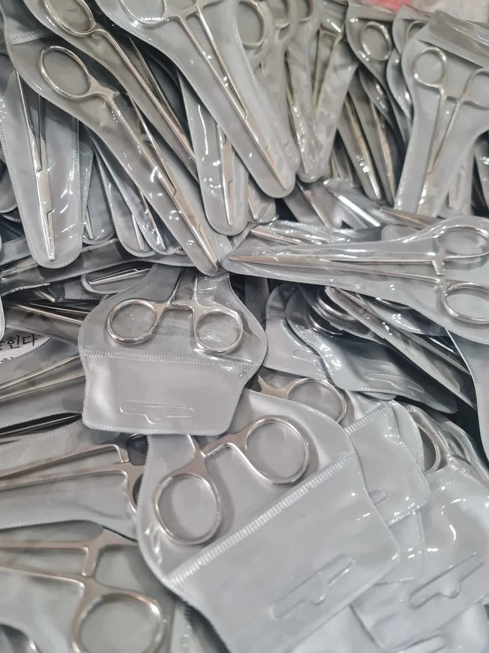 Packaged ring-handle forceps