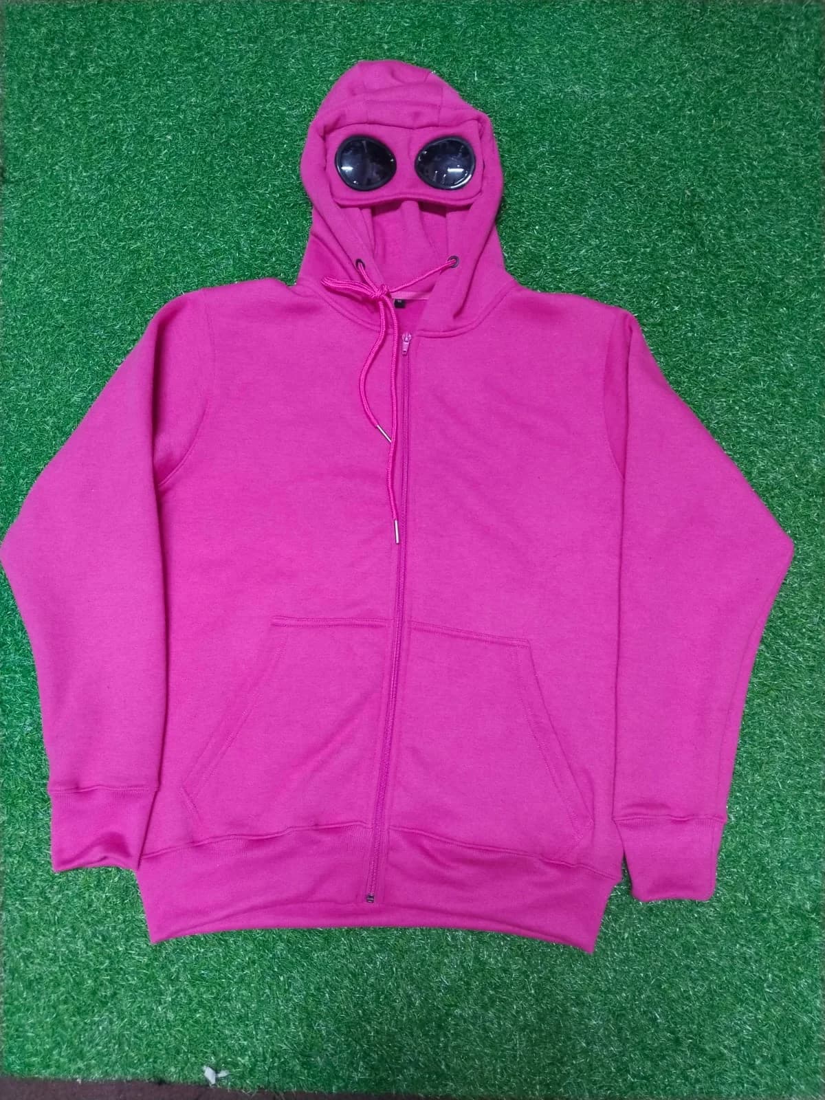 Pink zip-up hoodie with goggle hood