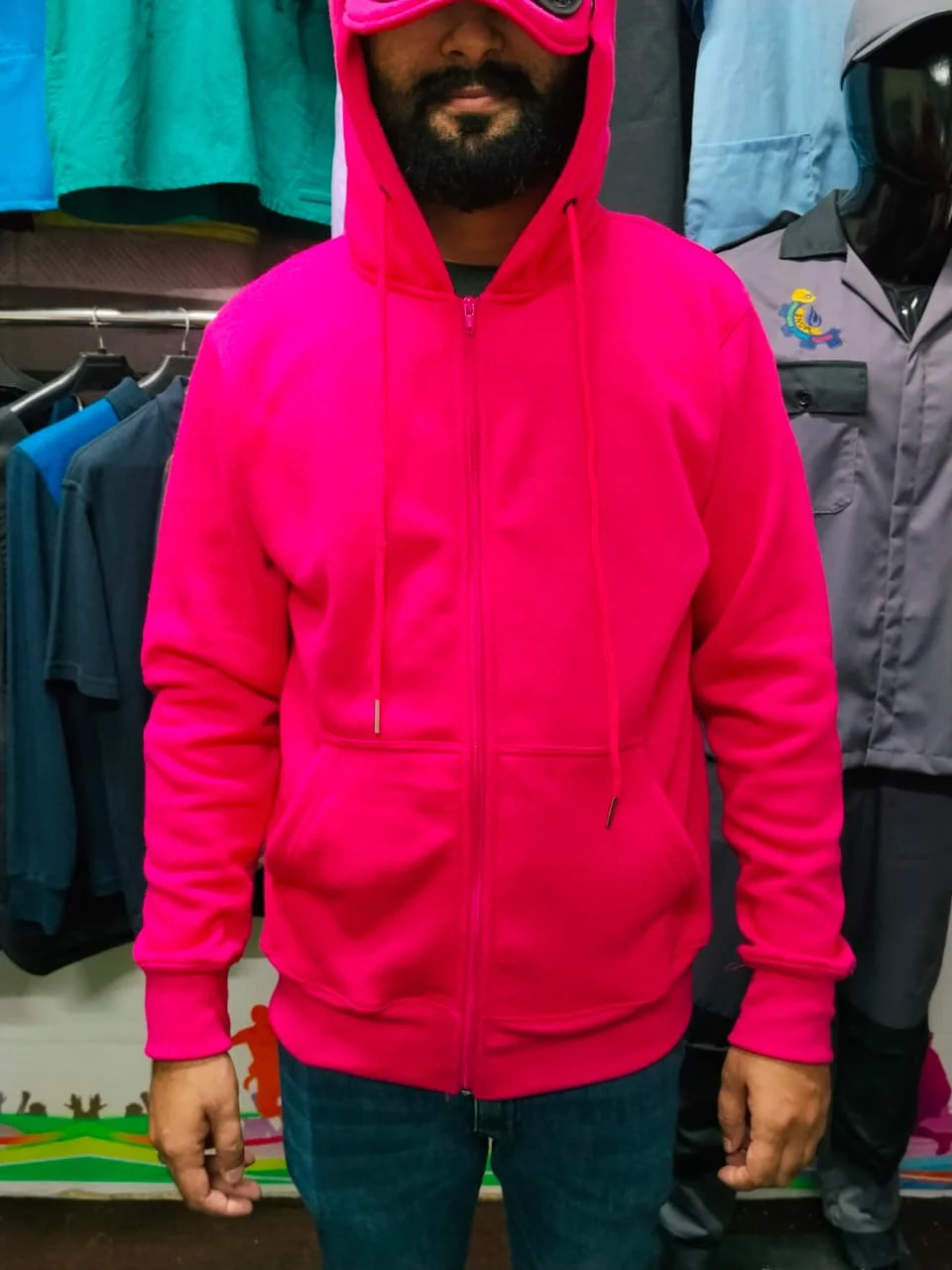 Pink zip-up hoodie with goggle hood