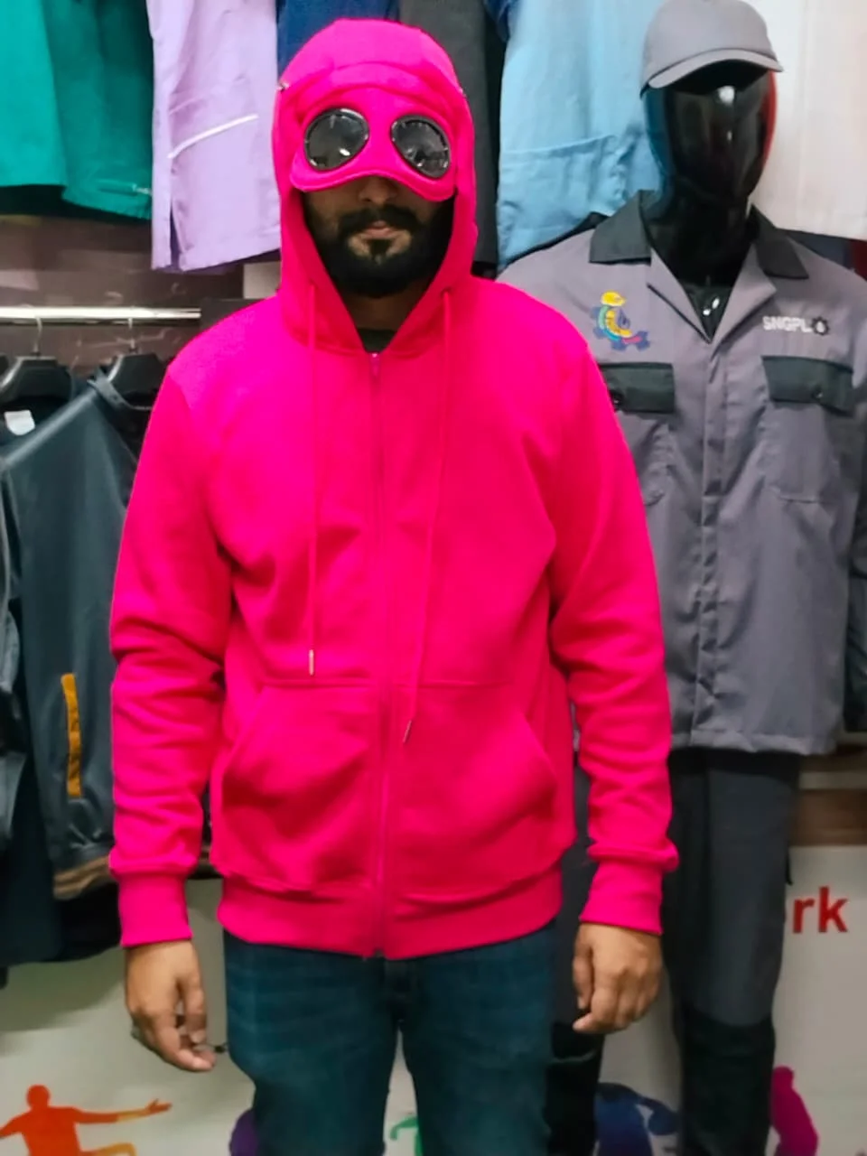 Pink zip-up hoodie with goggle hood