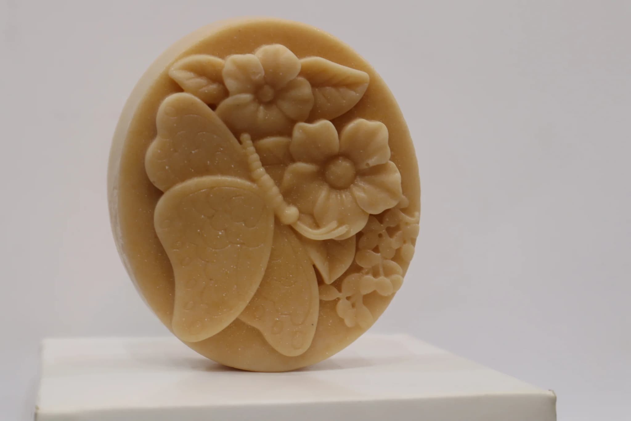 soap with butterfly and flower design