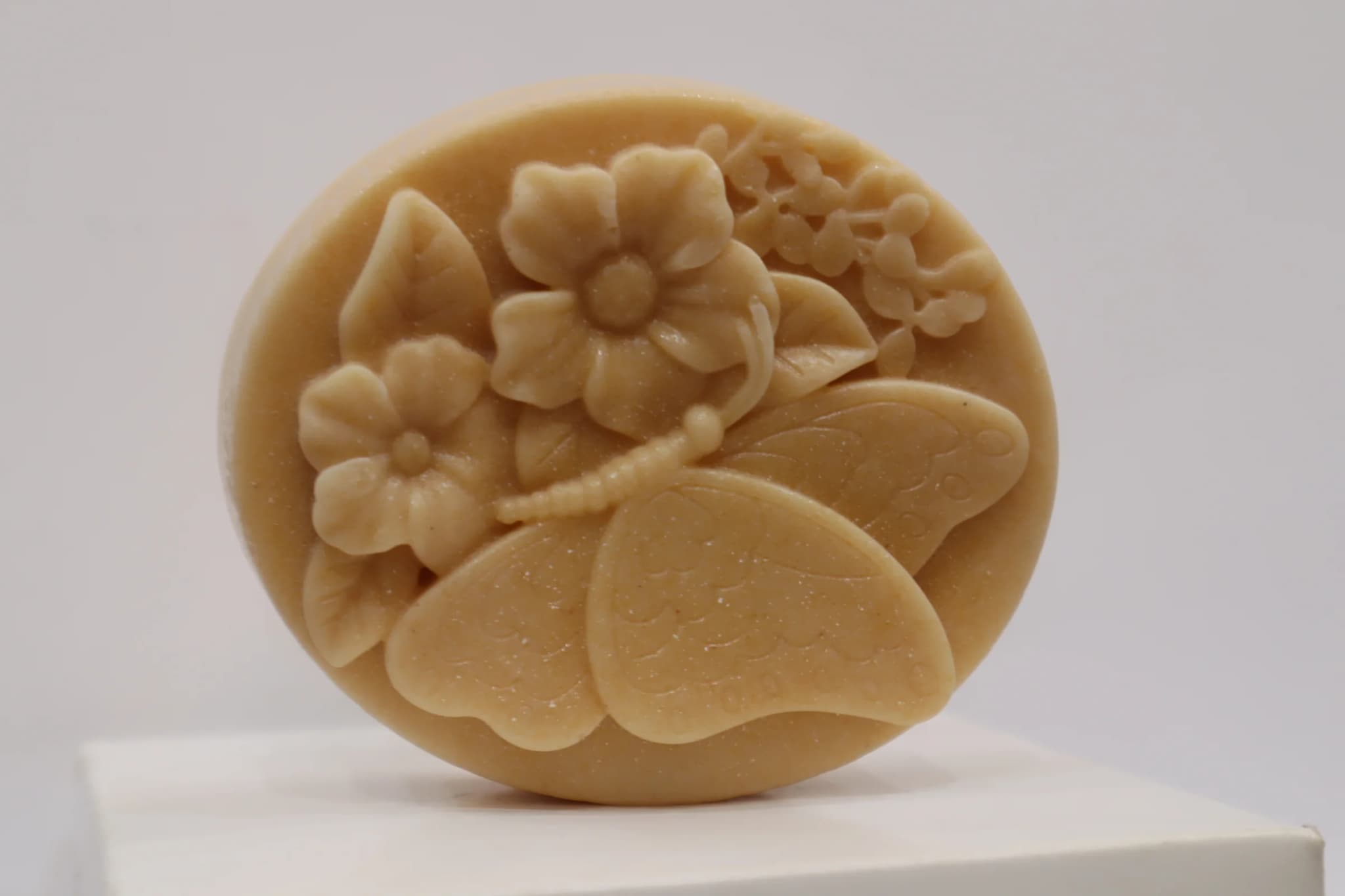 soap with butterfly and flower design