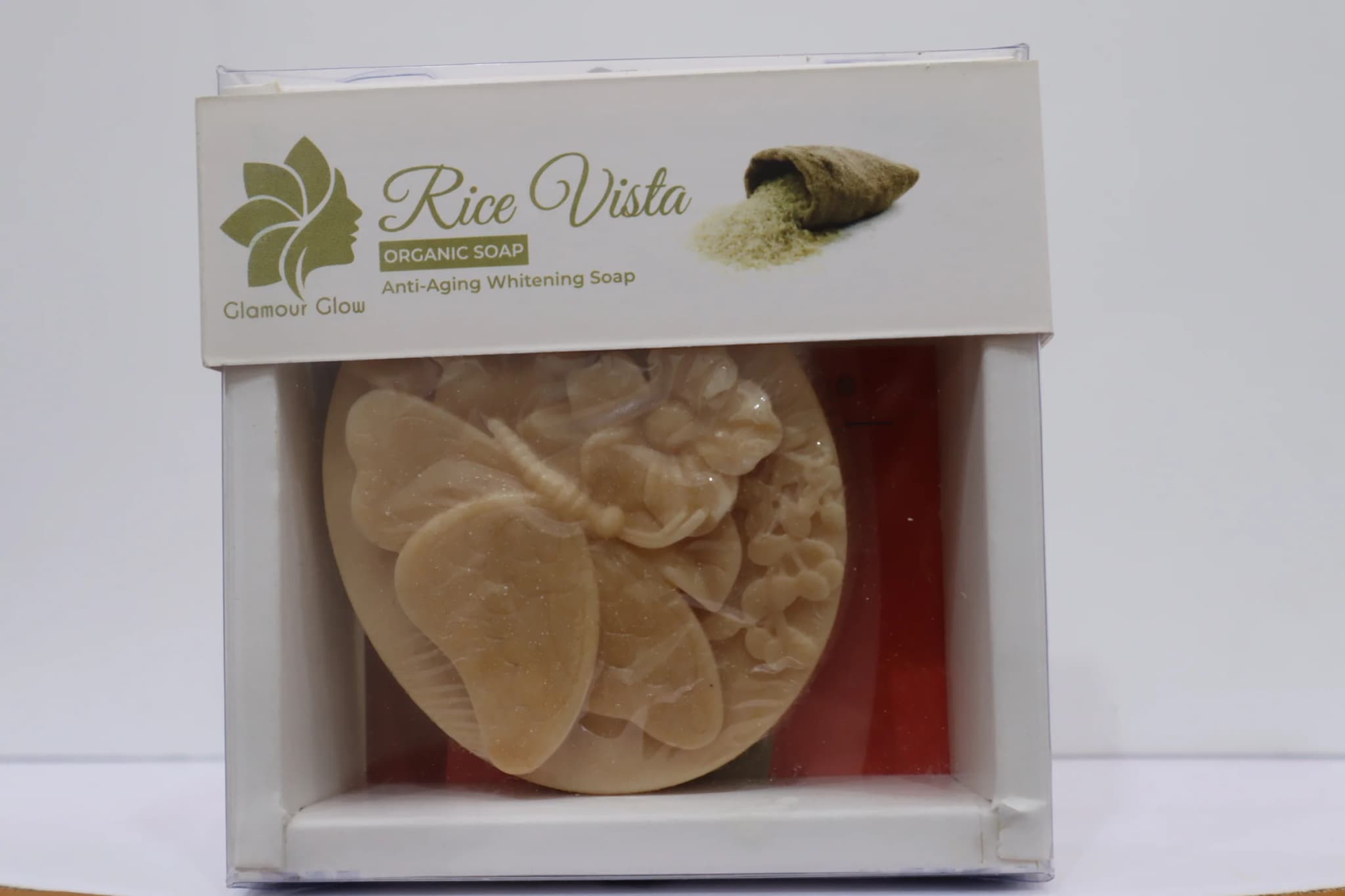 packaged soap with butterfly and flower design