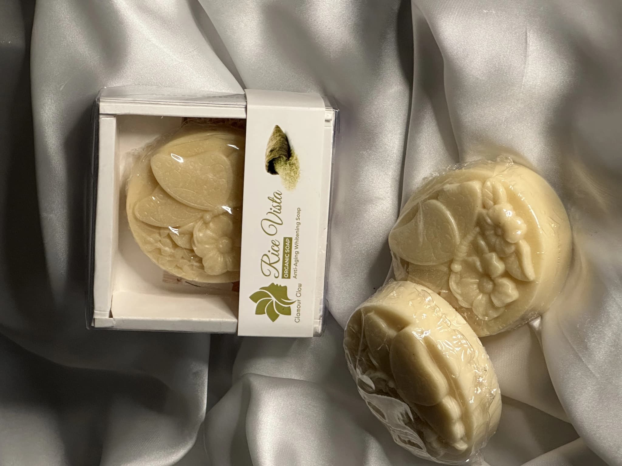 packaged and wrapped soap with butterfly and flower design