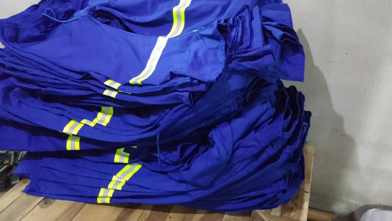 Stacked blue reflective trousers