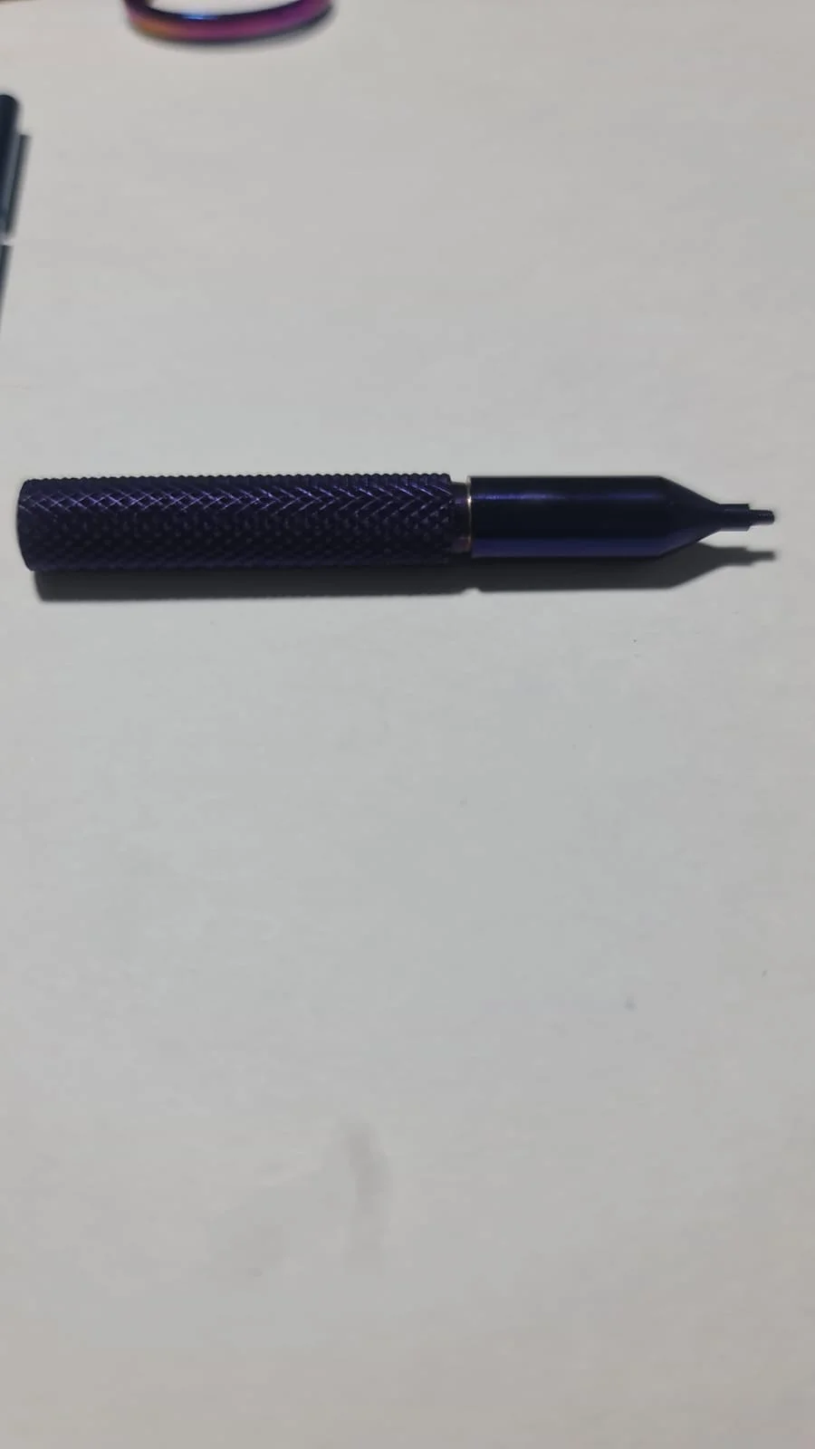 Textured grip piercing tool