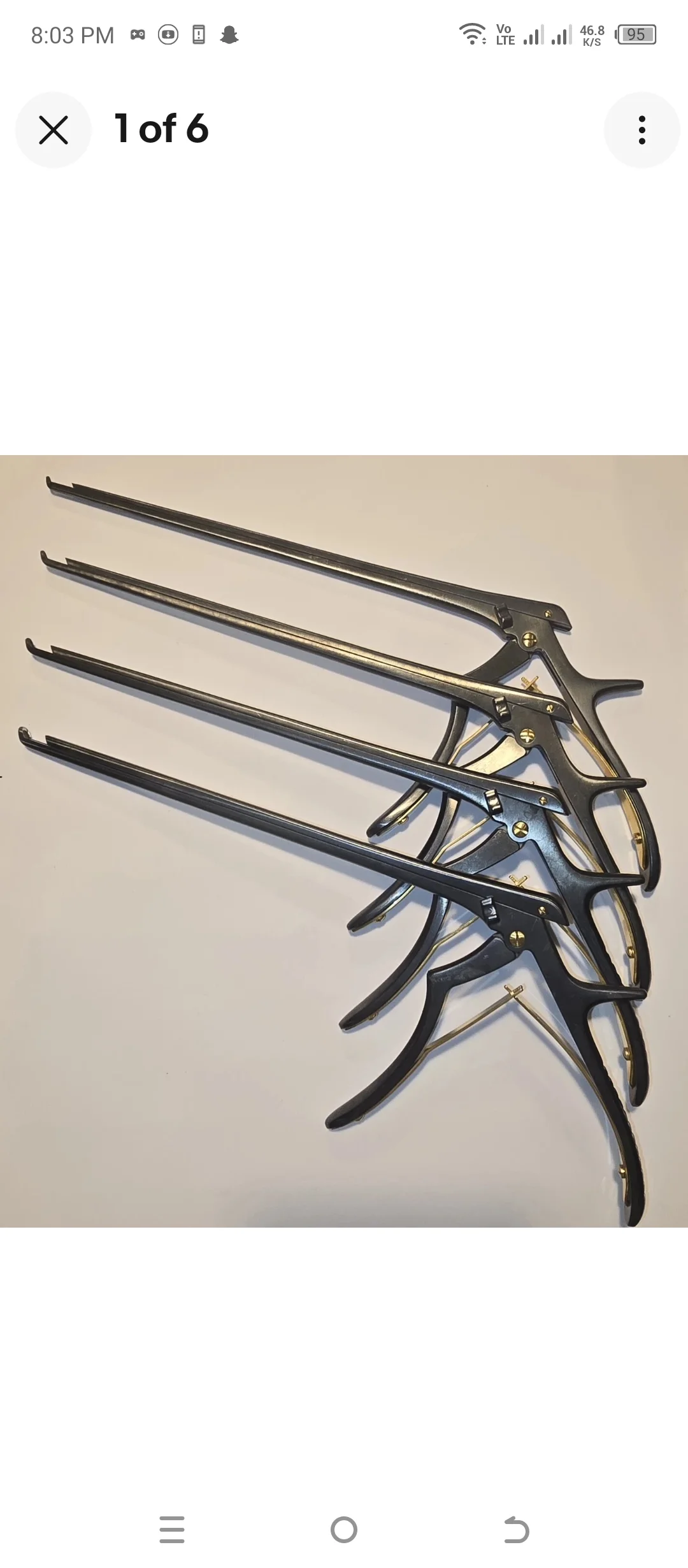 surgical rongeurs with gold accents