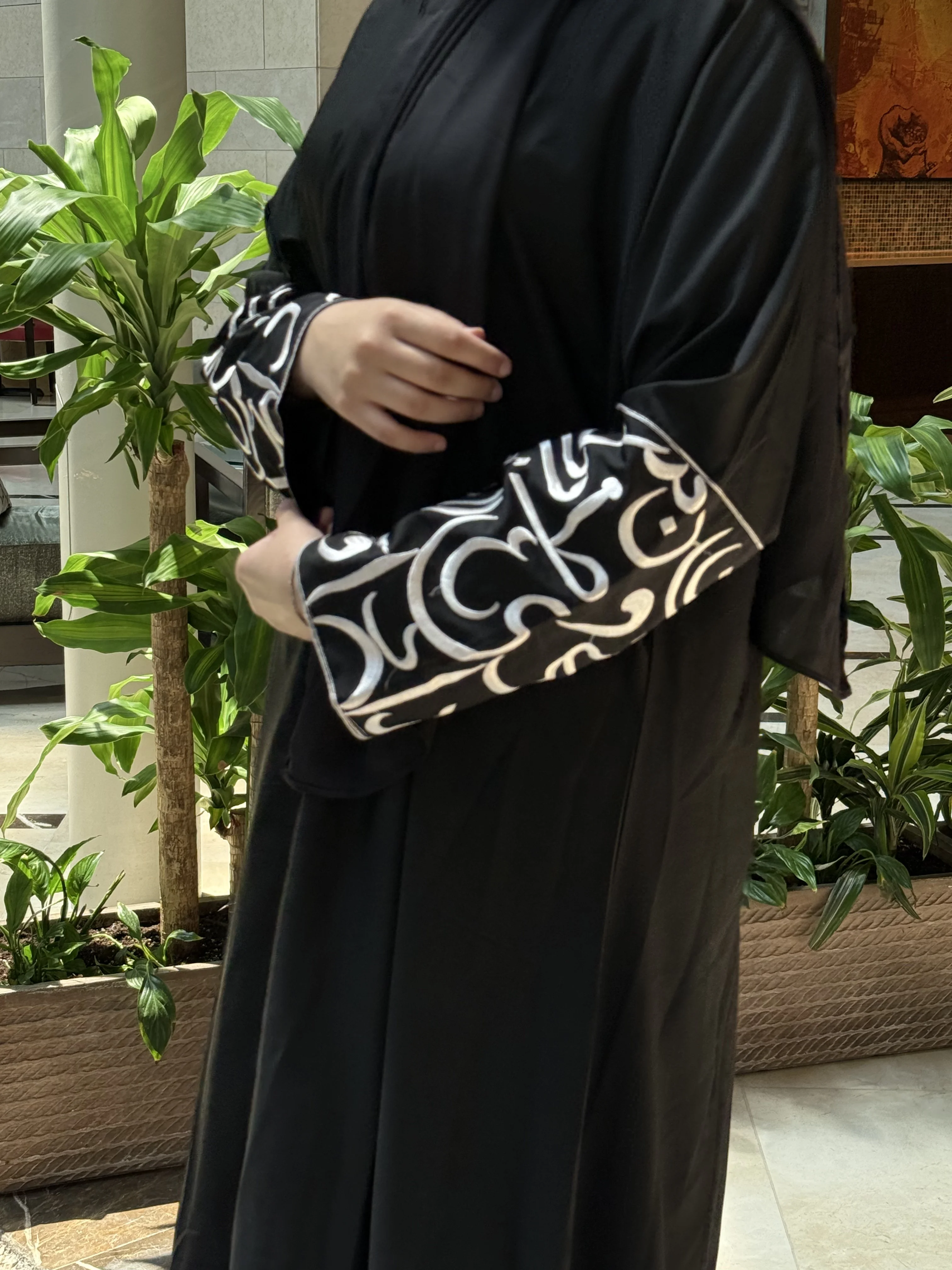 Abaya with white embroidered cuffs