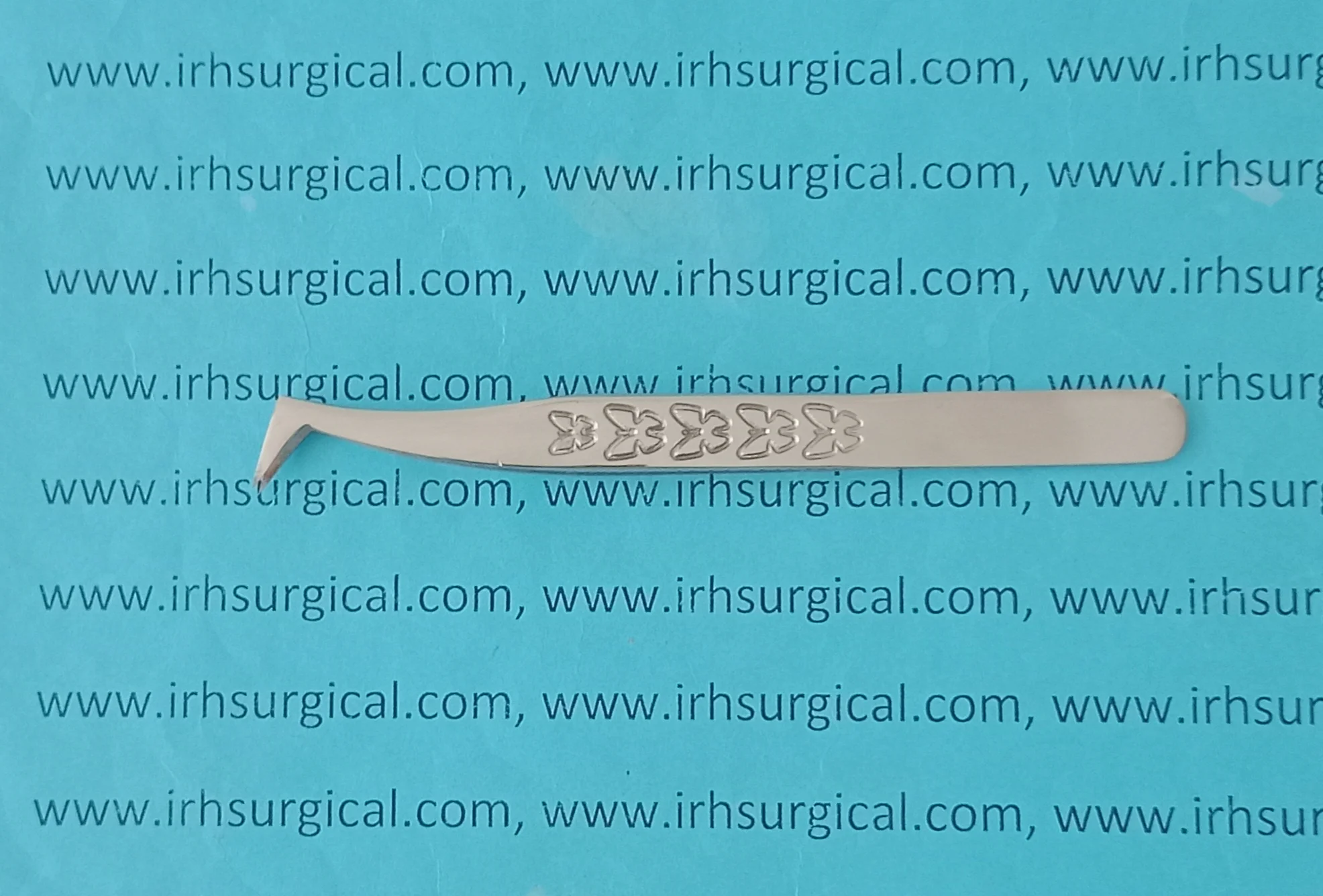 Angled eyelash tweezers