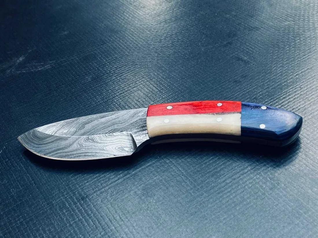 Custom Damascus knife with a coloured stabilised wood handle