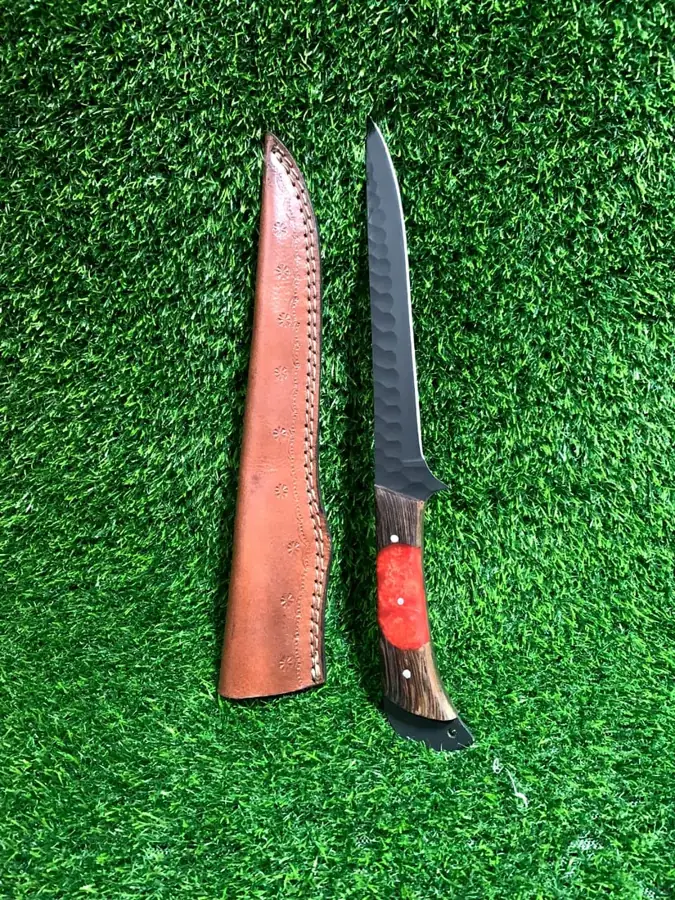 Hand-forged fillet knife with black blade and leather sheath