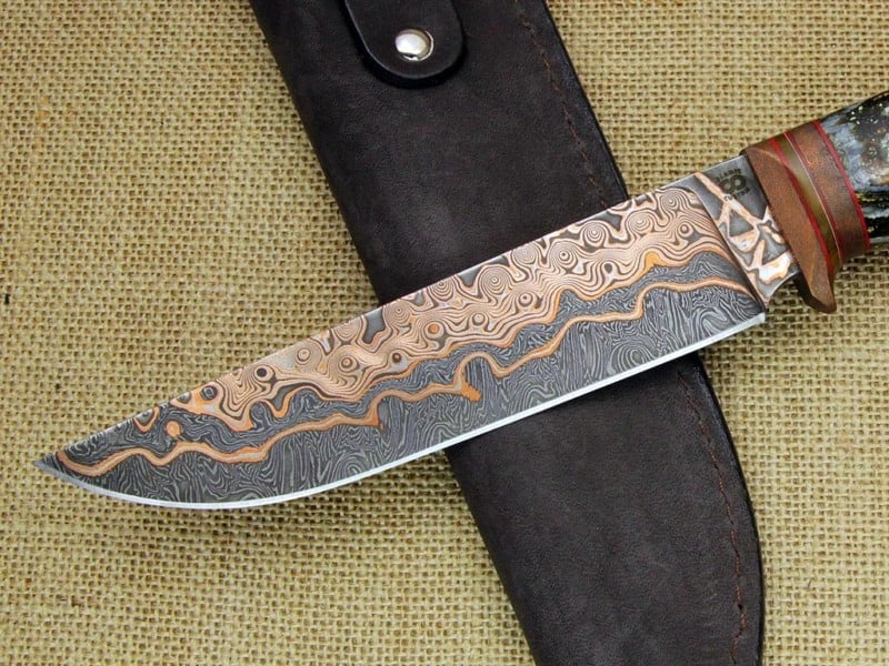 copper damascus knife